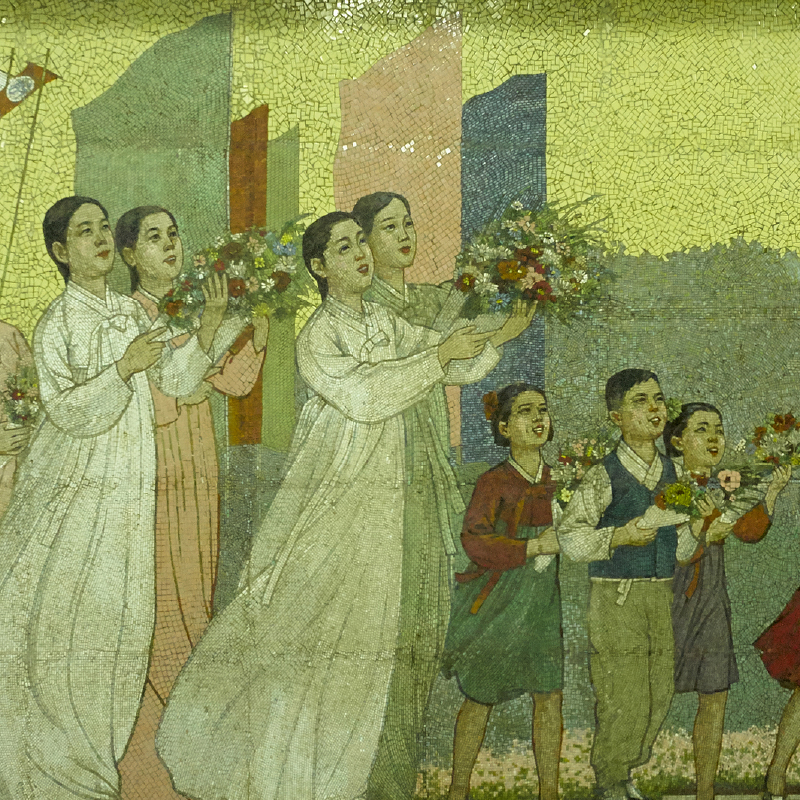 A mural of a group of people holding flowers

Description automatically generated